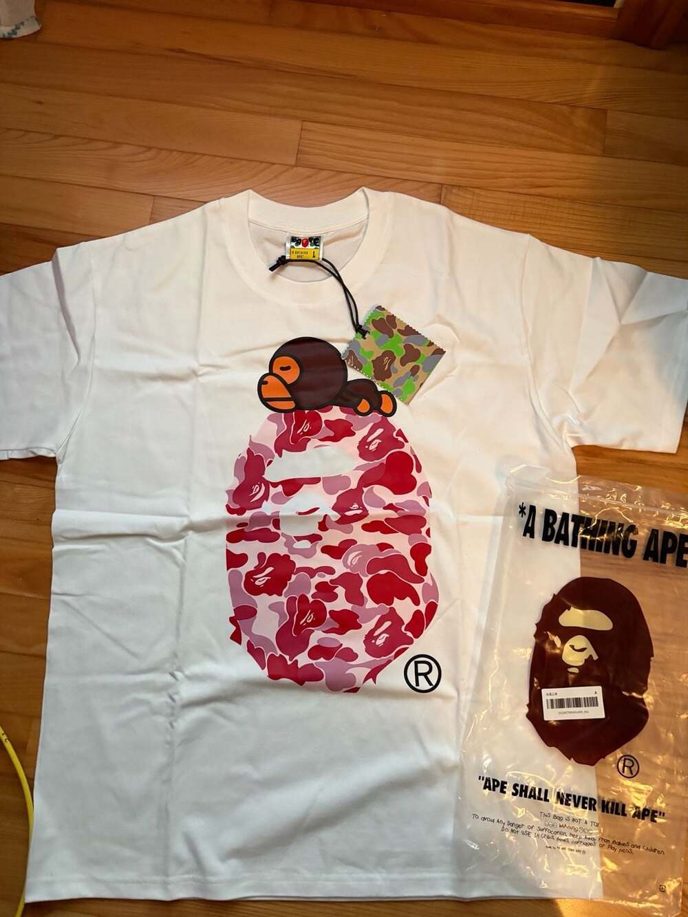A BATHING APE ABC Camo Milo on Big Ape Head T-Shirt in White/Pink